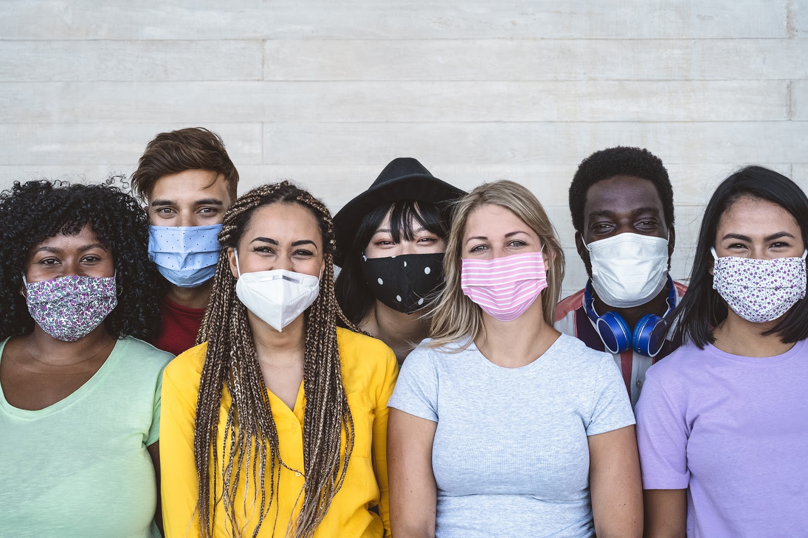 Group young people wearing face mask for preventing corona virus outbreak - Millennial friends with different age and culture portrait - Coronavirus disease and youth multi ethnic concept